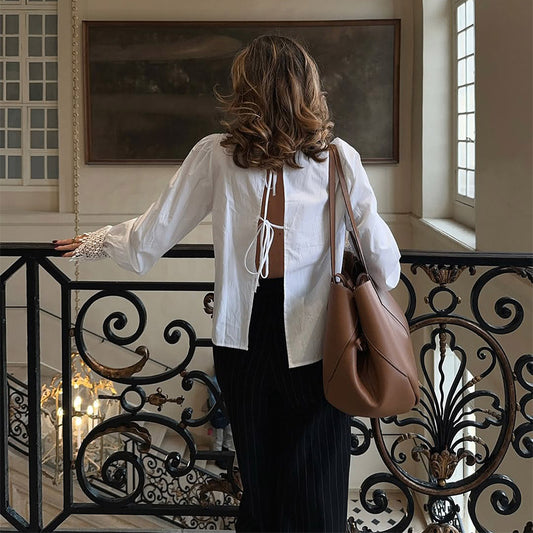 Chemisier pour femmes avec des accents de dentelle élégants et des manches bouffantes Chic und Stil