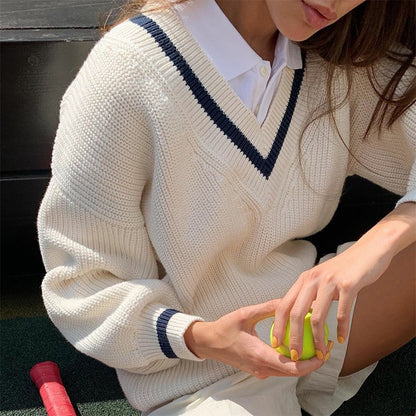 Pull décontracté pour femmes avec décolleté en V profond et rayures contrastées Chic und Stil