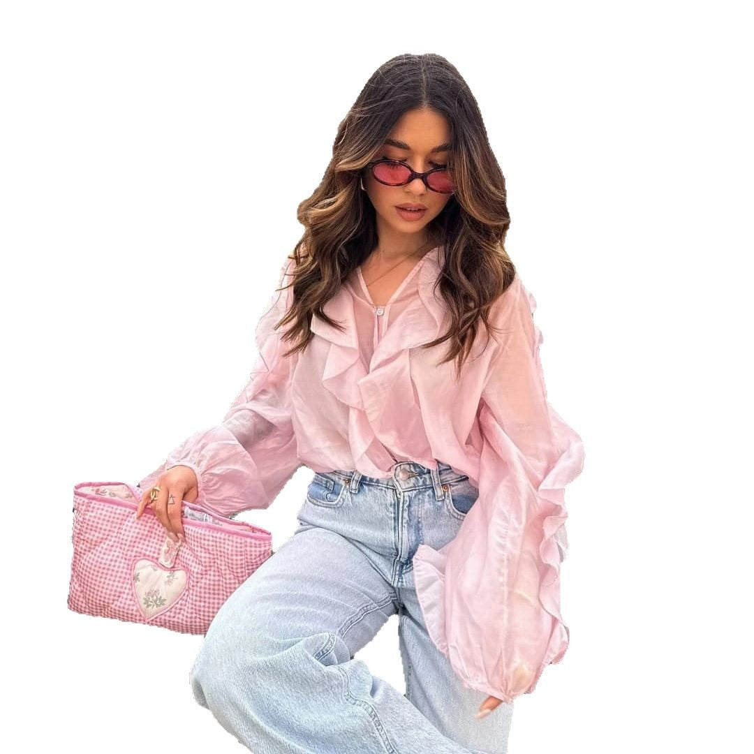 Blouse femme avec des détails de volants volumineux et un ourlet ondulé Chic und Stil