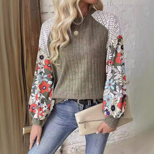 Pull femme à la forme ludique avec un design de manches florales Chic und Stil