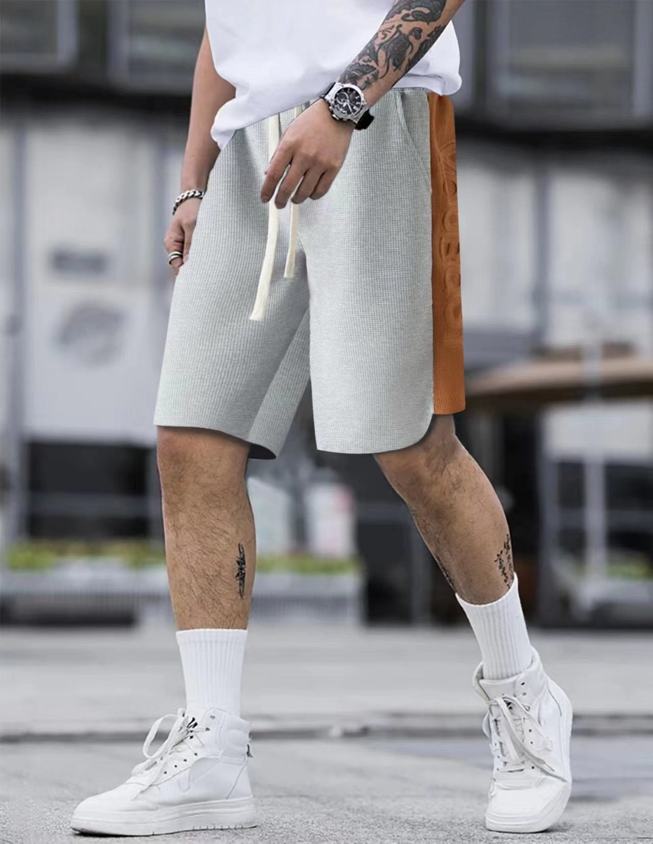 Shorts de sport pour hommes avec une structure riche en détails et une poche latérale innovante Chic und Stil