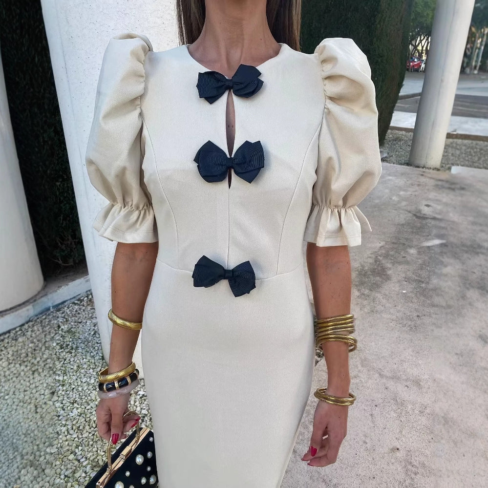 Dames Robe maxi élégante avec détail de nœud unique et conception à manches bouffantes Chic und Stil