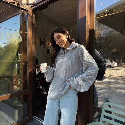 Comfortable knitted pullover for women with high collar and zip Chic und Stil