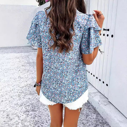 Chemisier femme avec des détails en volants floraux et décolleté en V Chic und Stil
