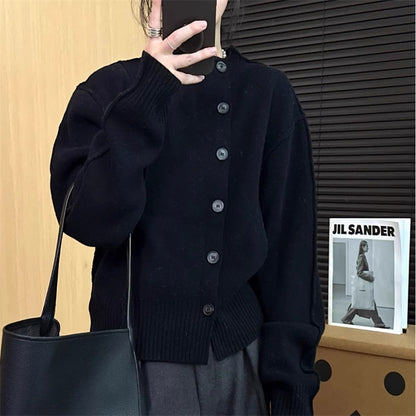 Cardigan femme avec détails de boutons et manches à larges côtes Chic und Stil