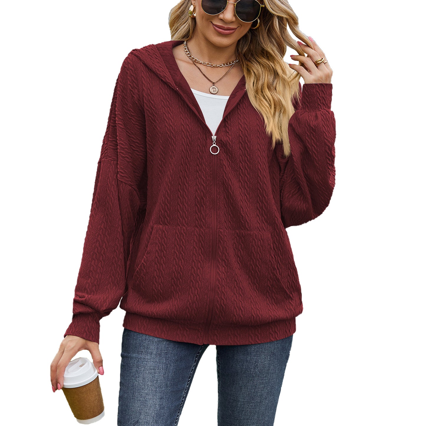 Dames Pull à capuche surdimensionné avec motif texturé et poches pratiques Chic und Stil