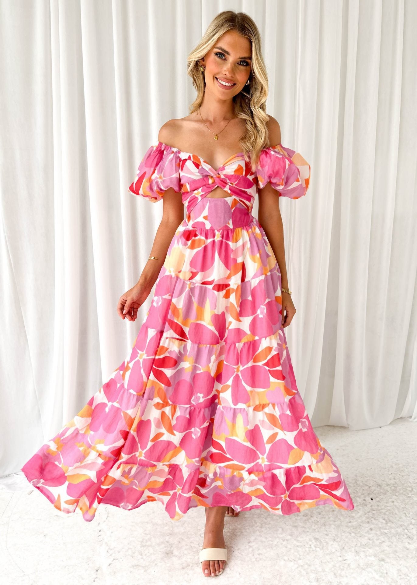Robe maxi femme avec des manches ballon volumineuses et imprimé floral Chic und Stil