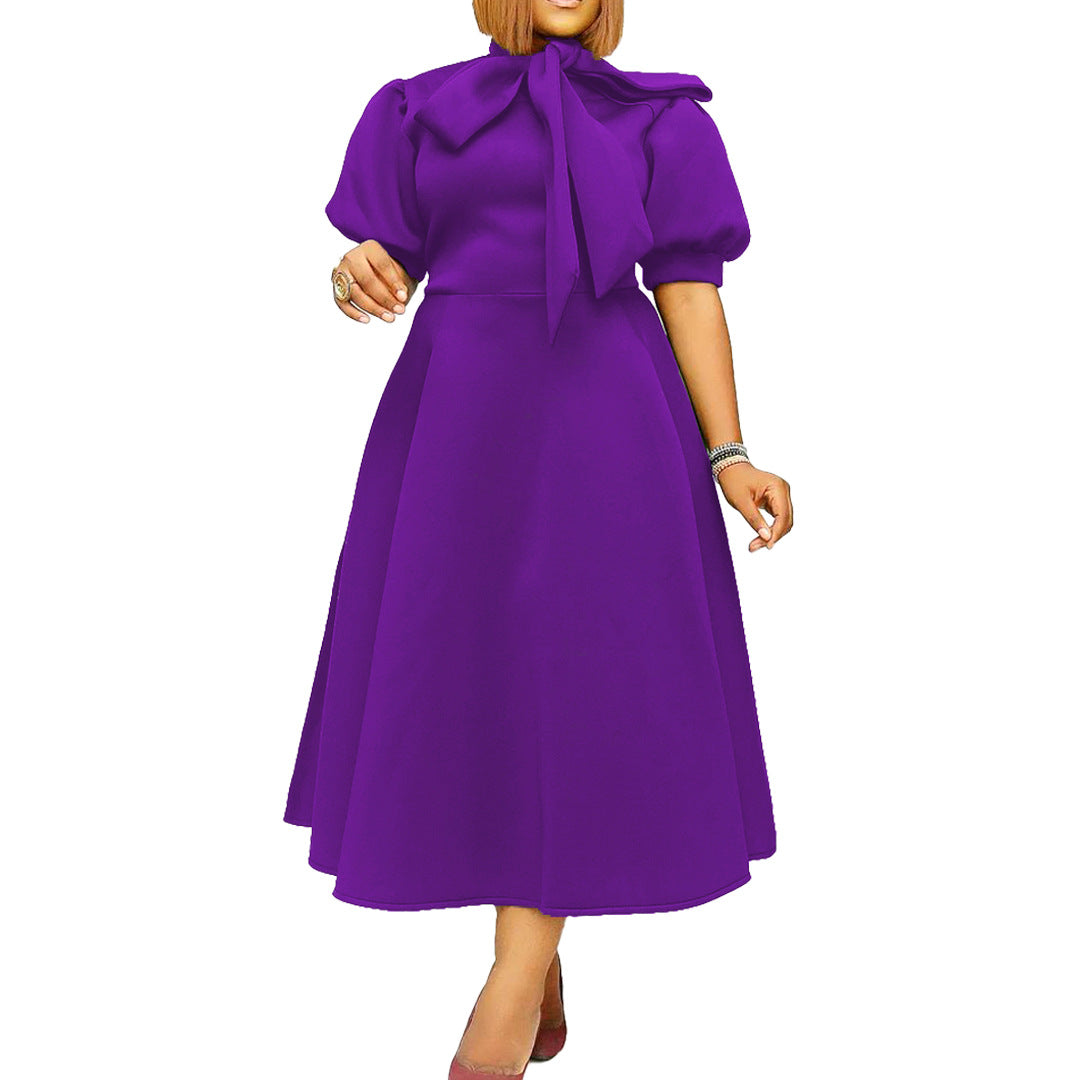 Robe midi femme avec col à nœud Chic und Stil