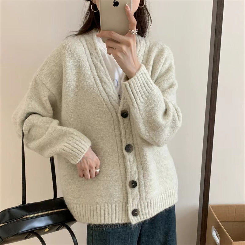 Dames Pull-over en tricot confortable avec un élégant décolleté en V et des détails de bouton Chic und Stil