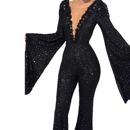 Ladies' glamorous jumpsuit with sparkling sequins and wide sleeves. Chic and stylish.
