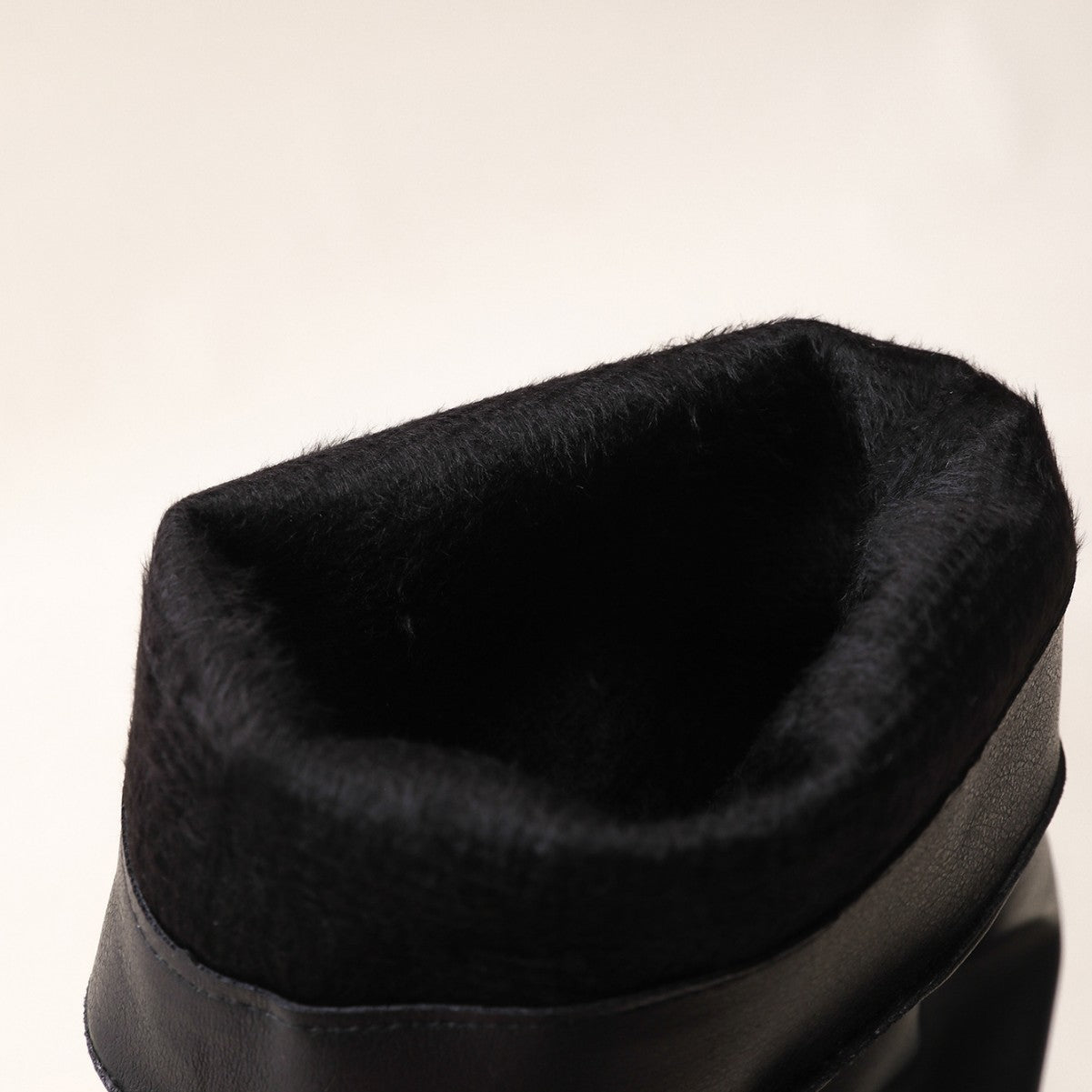 Bottes longues pour femmes avec un bel effet de fronces et un élégant talon bloc Chic und Stil