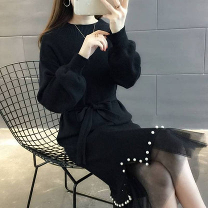 Robe tricotée élégante pour femmes avec ceinture à la taille et ourlet décoratif Chic und Stil