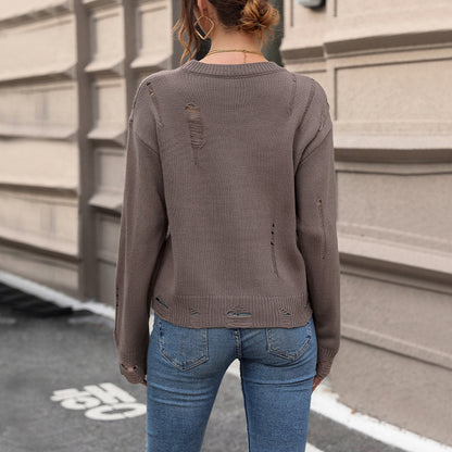 Pull en tricot décontracté pour femme avec un look utilisé à la mode et un col rond Chic und Stil