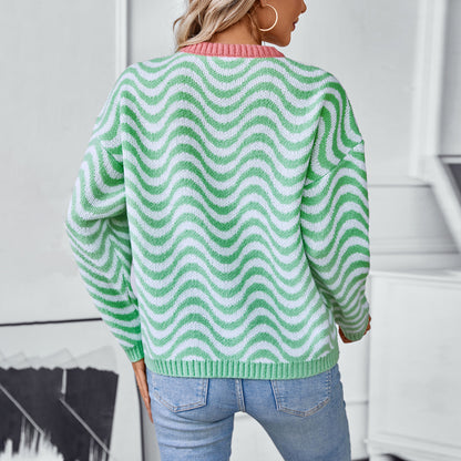 Femme pull confortable avec des motifs de vagues modernes et une coupe minimaliste Chic und Stil