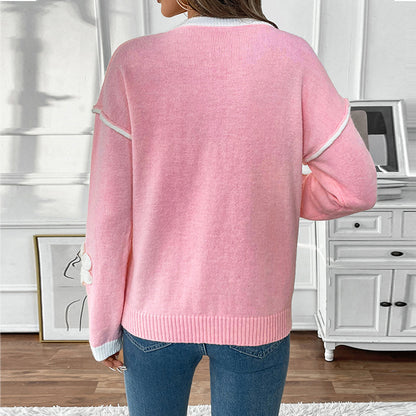 Pull femme décontracté avec des applications florales Chic und Stil