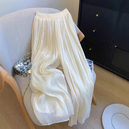 Pleated pants for women with elastic waistband and fluid fit Chic and Style