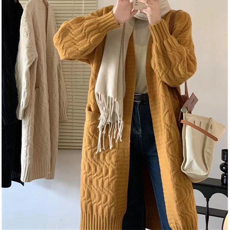 Cardigan en tricot pour femmes avec motif en relief et poches pratiques Chic und Stil