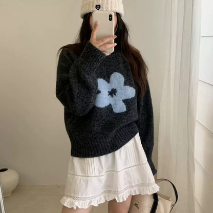 Pull femme avec design floral et matériau à poils longs Chic und Stil