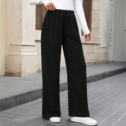 Loose fabric pants for women with a button row and elastic waist Chic and Style