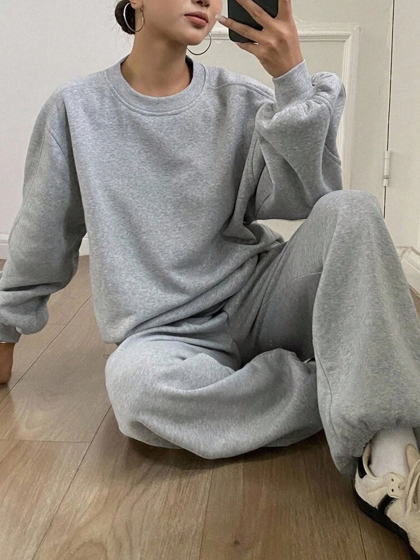 Ladies comfortable outfit of sweatshirt and jogging pants Chic and Style