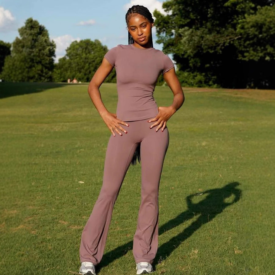 Chic and Style ladies' sporty outfit with fitted top and flared pants