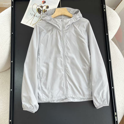 Veste de transition femme coupe-vent avec col à capuche ajustable Chic & Stil