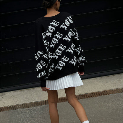 Pull en tricot décontracté pour femmes avec une inscription moderne et une coupe ample Chic und Stil