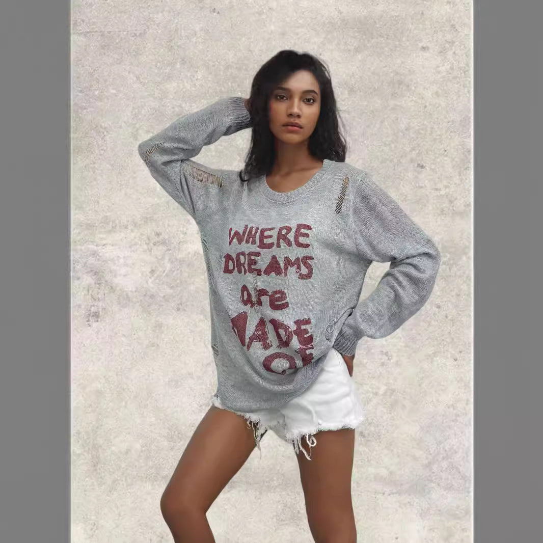 Pull oversized pour femmes avec des inscriptions créatives et des détails raffinés Chic und Stil