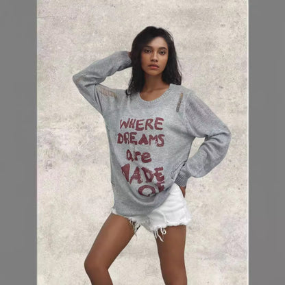 Pull oversized pour femmes avec des inscriptions créatives et des détails raffinés Chic und Stil