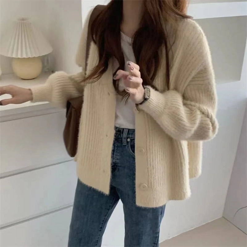 Dames cardigan douillet avec des détails de boutons modernes et une coupe oversized Chic und Stil
