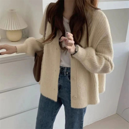 Dames cardigan douillet avec des détails de boutons modernes et une coupe oversized Chic und Stil