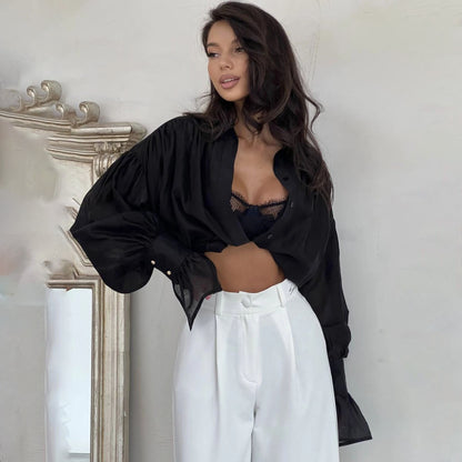 Blouse élégante pour femmes avec des épaules tombantes et des manches volumineuses Chic und Stil
