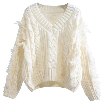 Pullover en tricot pour femmes avec des franges accrocheuses et un motif de torsades Chic und Stil