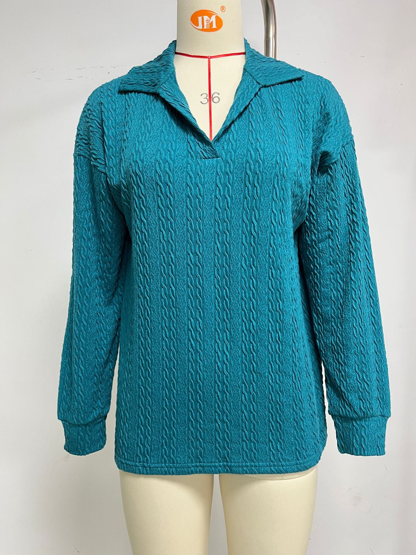 Pull décontracté femme avec motif de câble texturé Chic und Stil