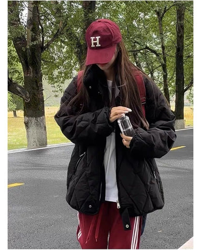 Functional quilted jacket for women with high collar and practical pockets Chic and Style