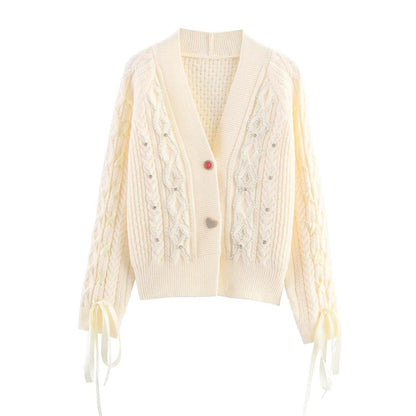 Dames élégante cardigan avec boutons décoratifs et détails de volants Chic und Stil