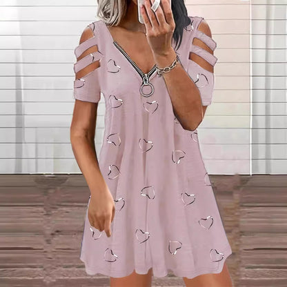 Robe de loisirs pour dames avec des manches à découpe et un motif en forme de cœur Chic und Stil