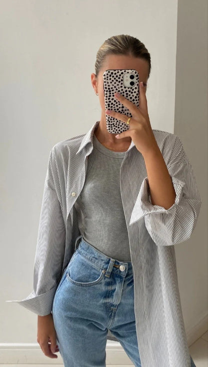 Blouse oversize femmes avec motif à rayures et ourlet arrondi Chic und Stil