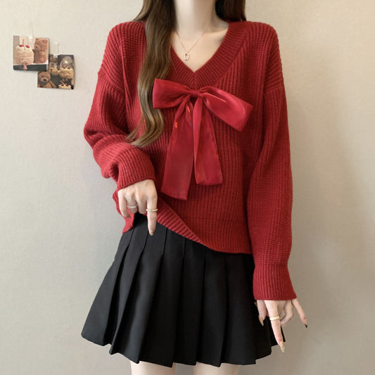 Pull en tricot pour femme avec décolleté en V et accent de nœud décoratif Chic und Stil