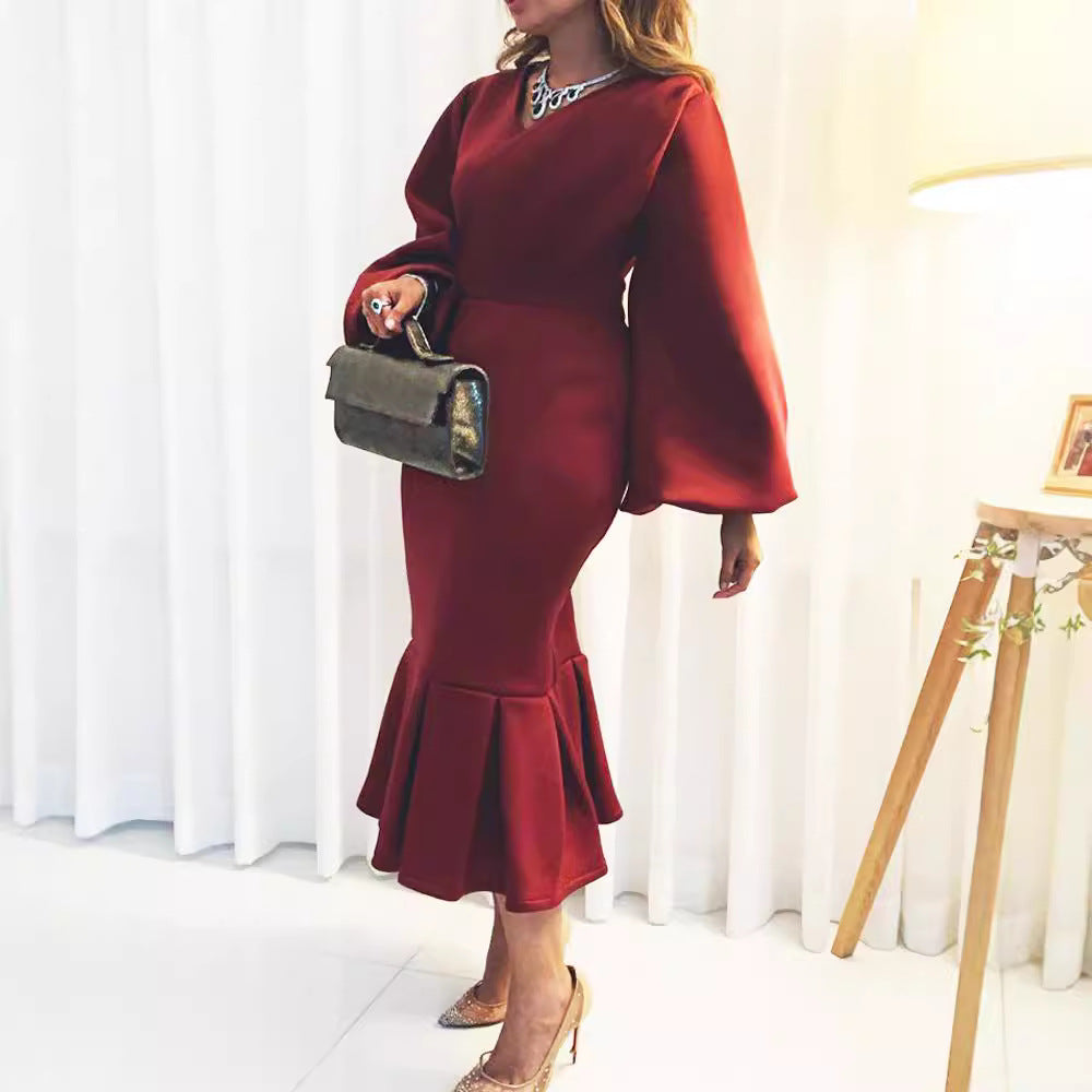 Robe ajustée pour femmes avec des manches volumineuses et un ourlet flottant Chic und Stil