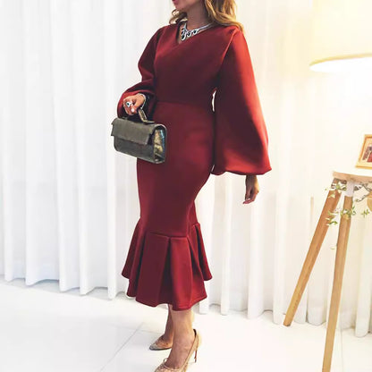 Robe ajustée pour femmes avec des manches volumineuses et un ourlet flottant Chic und Stil