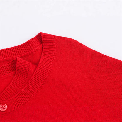 Pull en tricot court pour femmes avec détail de bouton et décolleté en V Chic und Stil