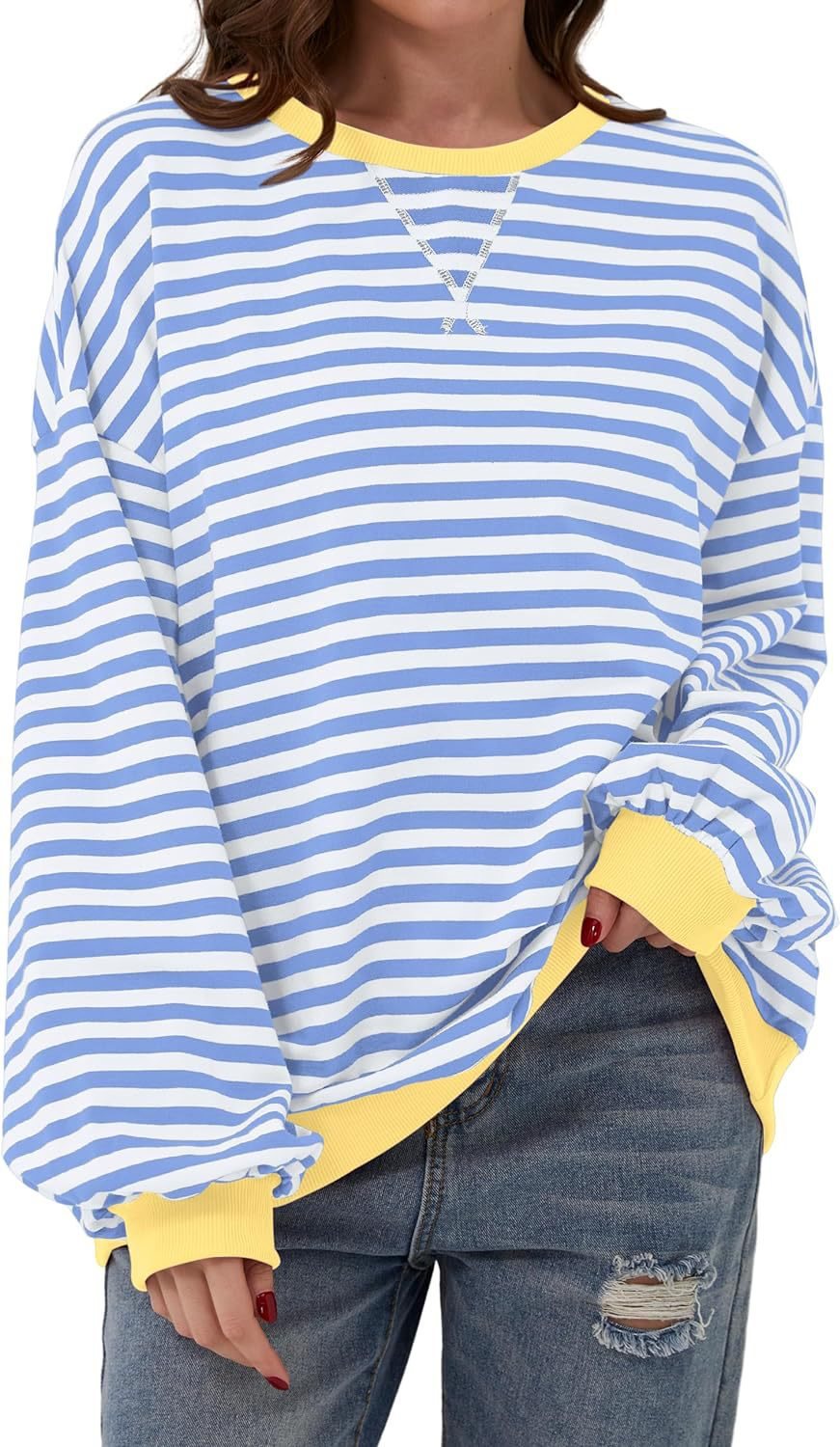 Femme pull décontracté avec motif rayé saisissant et bords élastiques Chic und Stil