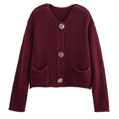Veste en tricot pour femmes avec des boutons décoratifs Chic und Stil