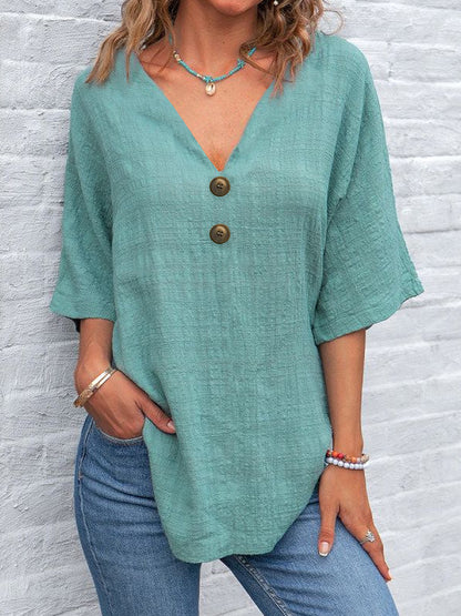 Blouse dames à col en V avec boutons décoratifs et coupe décontractée Chic und Stil
