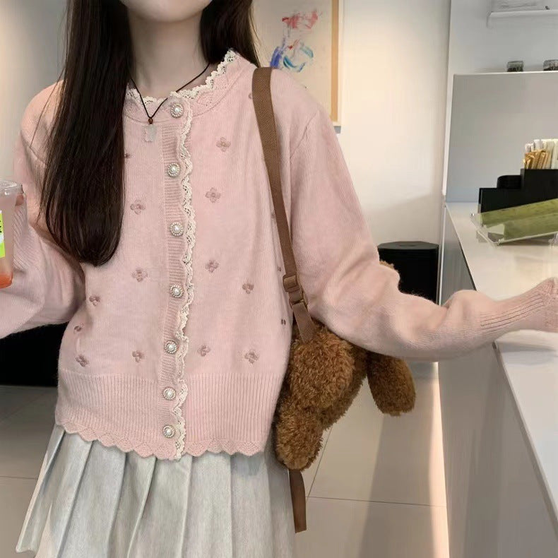 Dames Élégante cardigan en tricot avec boutons perlés et design structuré Chic und Stil