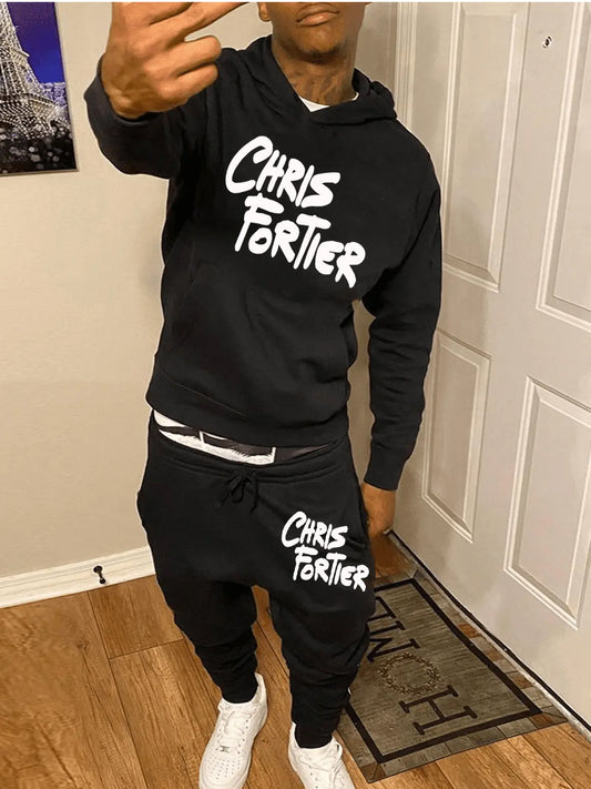 Dames ensemble de hoodie et de sweatpants sportif avec inscription accrocheuse Chic und Stil