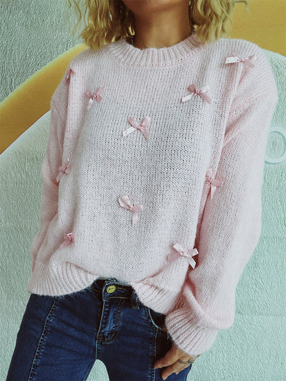 Pull en tricot pour femmes avec des accents de nœuds ludiques Chic und Stil