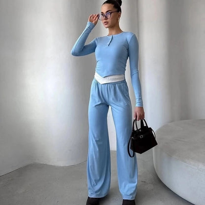 Fashionable lounge set for women with a versatile top and chic elastic pants.