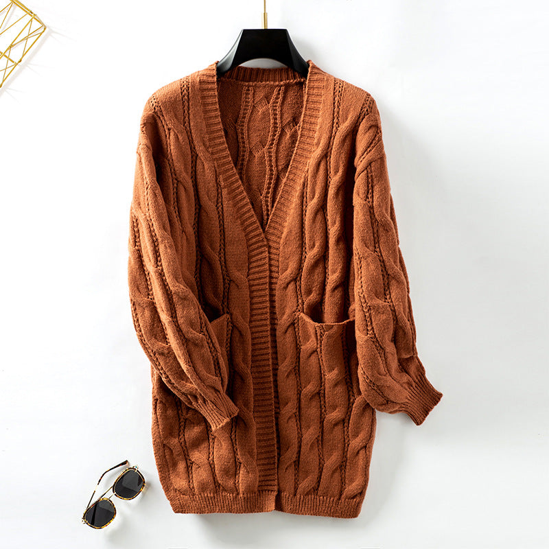 Veste en tricot pour femmes avec un élégant motif tressé Chic und Stil